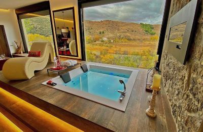 Habitación con jacuzzi y vistas al campo